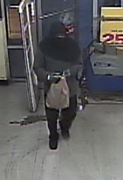 Suspect wanted for robbery to a business