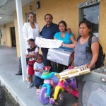 Family in front of box office