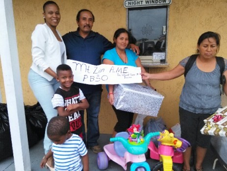 Family in front of box office