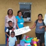 Family in front of box office