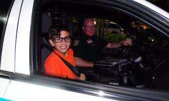 Reserve Auxiliary Deputy shop with a cop